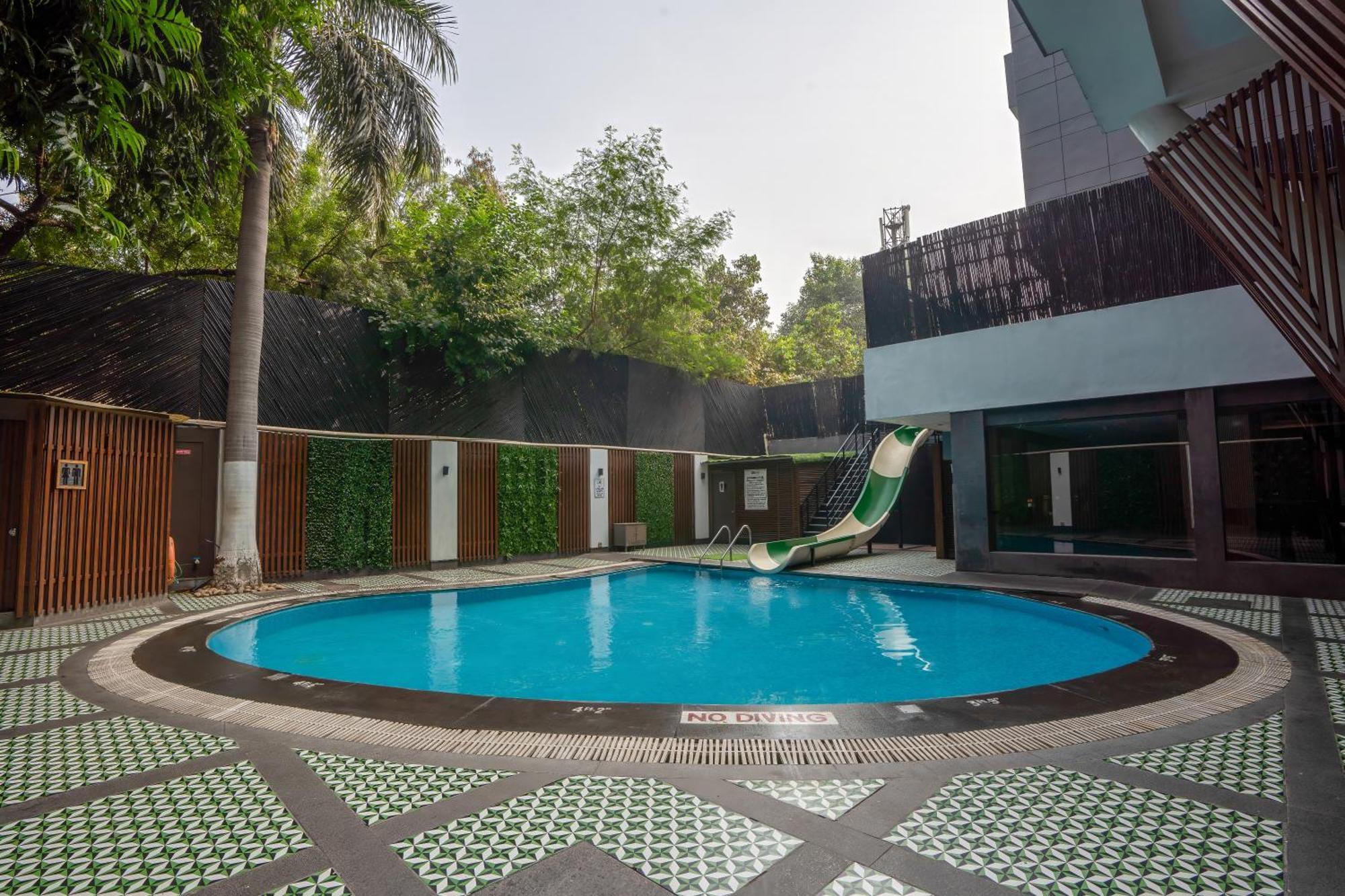 Park Inn By Radisson,South Delhi New Delhi Exterior photo Swimming pool at the school